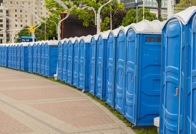 a row of portable restrooms for a special event, ensuring guests have access to clean facilities in Appleton